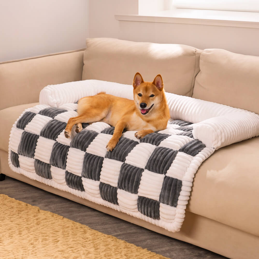 https://cdn.shopify.com/s/files/1/0549/1638/2879/files/CreamSquarePlaidCozyDogMatFurnitureProtectorCover-_1.jpg?v=1739349876