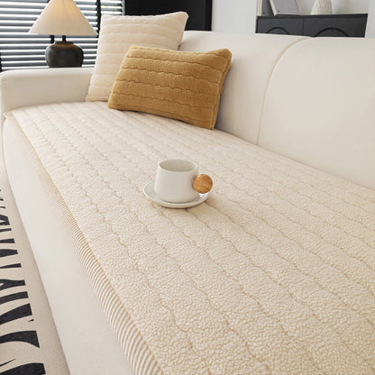 https://cdn.shopify.com/s/files/1/0549/1638/2879/files/FUNNYFUZZYCreamySoftBreathableLambskinCouchCover-3.jpg?v=1739440359