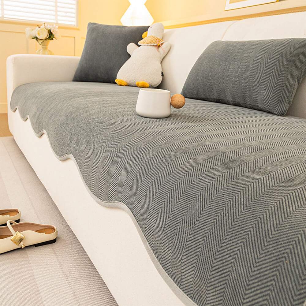 https://cdn.shopify.com/s/files/1/0549/1638/2879/files/FunnyFuzzyMinimalistHerringboneChenilleNon-SlipWavyEdgeCouchCover-11.jpg?v=1747300476