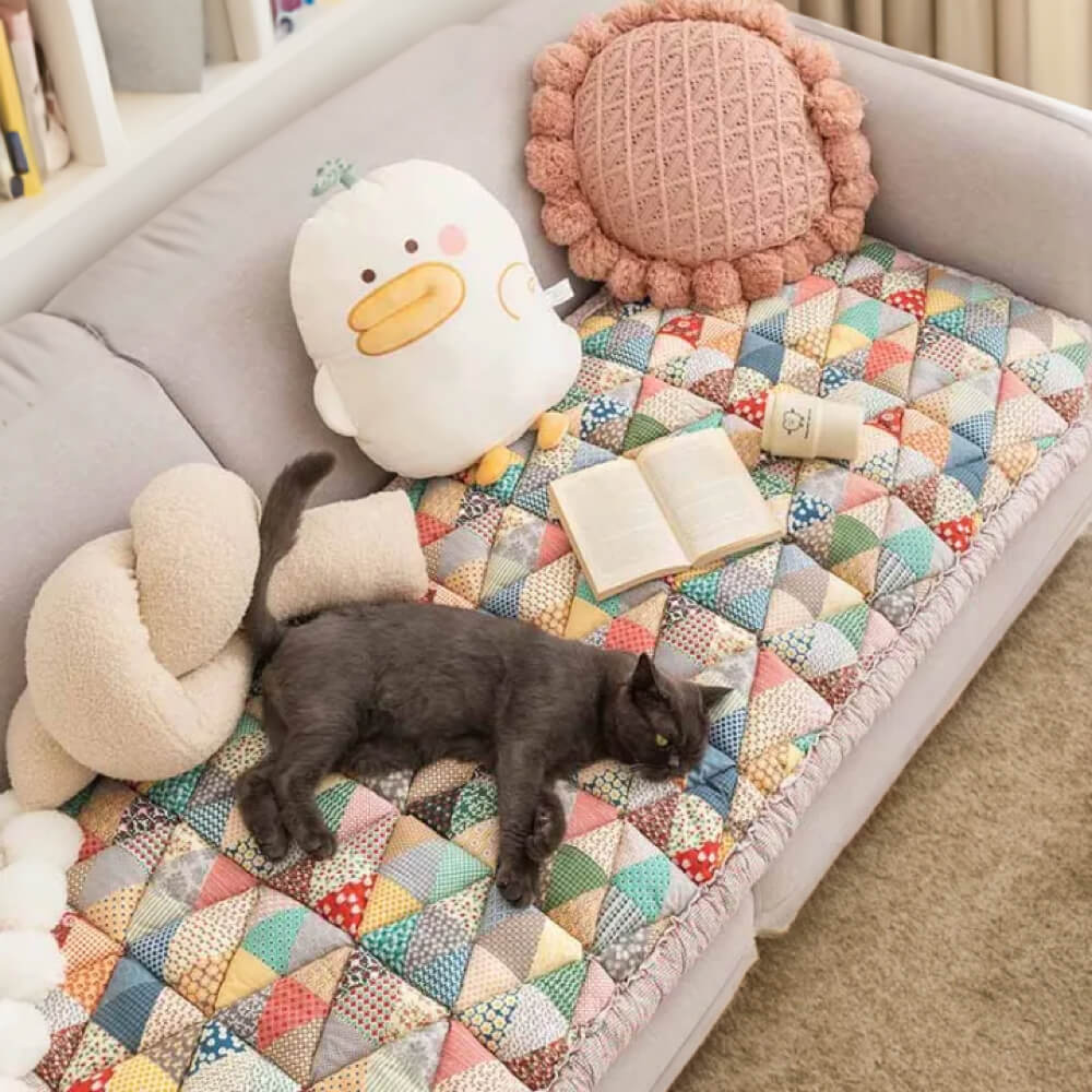 https://cdn.shopify.com/s/files/1/0549/1638/2879/files/GardenChicCottonProtectiveCouchCover_Iris_23.6x63in.jpg?v=1711438366