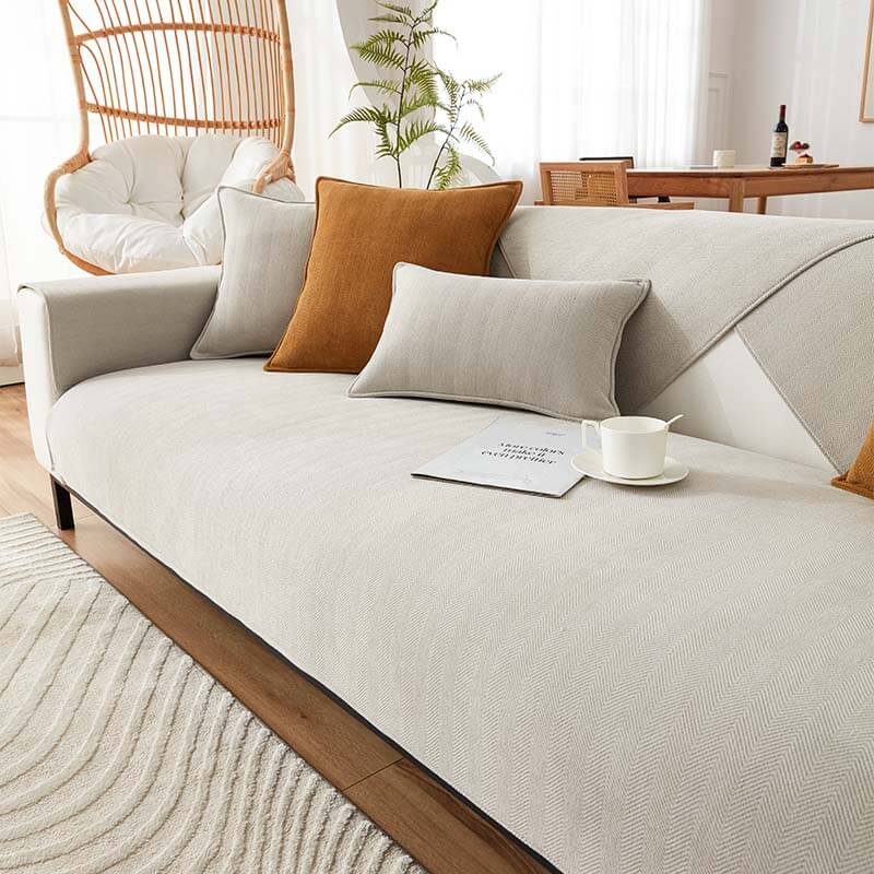 https://cdn.shopify.com/s/files/1/0549/1638/2879/files/HerringboneChenilleFabricFurnitureProtectorSofaCover_12.jpg?v=1719484980