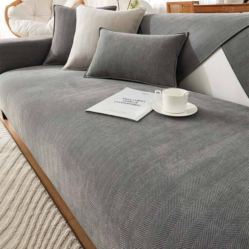 https://cdn.shopify.com/s/files/1/0549/1638/2879/files/HerringboneChenilleFabricFurnitureProtectorSofaCover_8.jpg?v=1719484990
