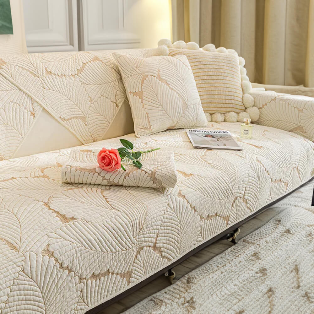 https://cdn.shopify.com/s/files/1/0549/1638/2879/files/Leaf-Sofa-Mat-Furniture-Anti-scratch-Skid-Protection-Couch-Cover-_1__900x_a66acaf4-f1eb-4bcf-9baf-9e46701713eb.jpg?v=1699873353