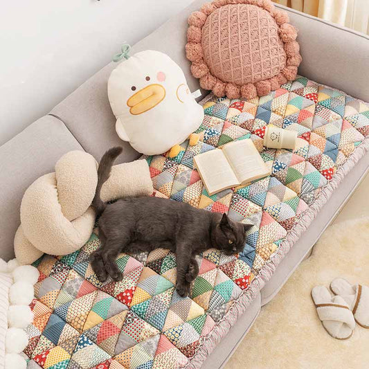 https://cdn.shopify.com/s/files/1/0549/1638/2879/files/funnyfuzzyGardenChicCottonProtectiveSofaCover-_1.jpg?v=1684207300